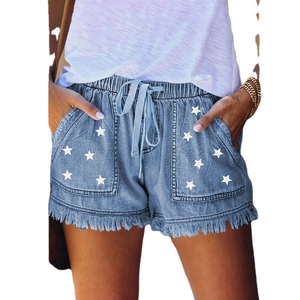 Women's light blue denim shorts with white star print and frayed hem for summer