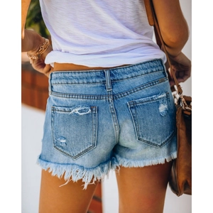 Women's light blue distressed denim shorts with raw hem and back pocket detail