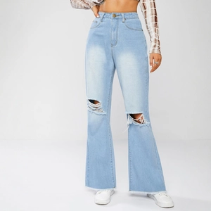 High waist light blue flared jeans with ripped knees and raw hem detail for women