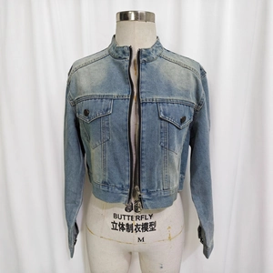 Short denim jacket in light blue wash with stand collar and zipper closure for women