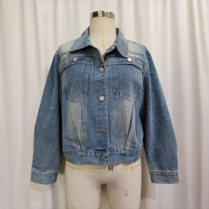 Classic distressed blue denim jacket for women featuring button front and chest pockets