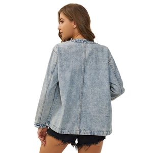 Women's light blue oversized denim jacket with distressed wash and vintage loose fit