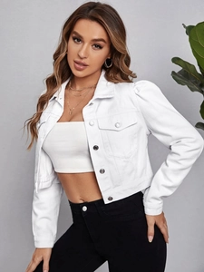 Detail of white cropped denim jacket with puff sleeves and metal buttons