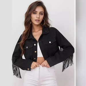 Women's black cropped denim jacket with fringed tassel sleeves and distressed raw hem edge