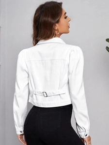 Rear view of white denim cropped jacket with puff sleeves and adjustable metal buckles
