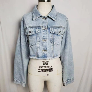 Women's acid wash light blue sequined denim jacket with raw hem and cropped fit style