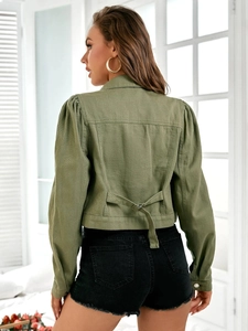 Detail of army green puff sleeve denim jacket showing the adjustable buckled back strap