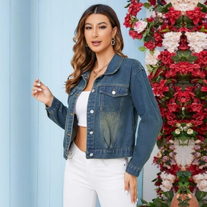 Classic blue washed denim jacket for women featuring metal buttons and a fitted short style
