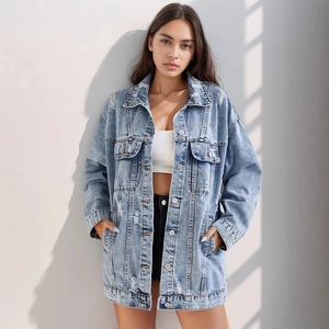 Vintage light blue distressed denim jacket for women with ripped details and chest pockets