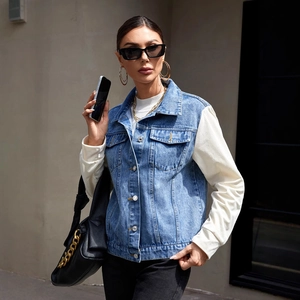 Women's denim jacket with blue washed body and white striped patchwork long sleeves