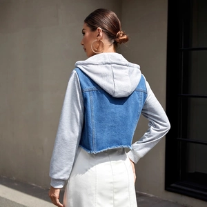Women's casual denim jacket with light gray jersey hood and sleeves, cropped fringe hem