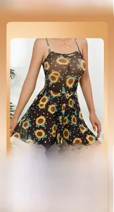Detail of sheer black mesh dress with sunflower floral print and delicate thin straps