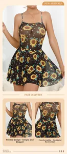 Detail of sheer mesh dress with daisy and polka dot prints and comfortable waist