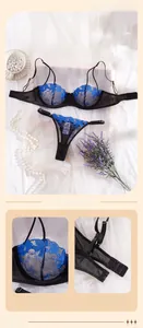 Détails de soutien-gorge en dentelle noire avec broderie bleue et boucle arrière réglable