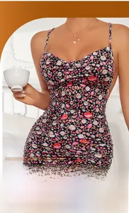 Detail of floral backless mini dress with ruching and sweetheart neckline in navy blue