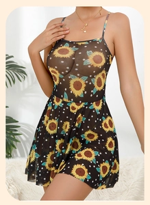 Close-up of sheer black mesh dress with yellow sunflower print and delicate straps