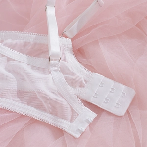 White French lace bra with triple hook-and-eye closure and adjustable straps detail