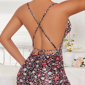 Floral backless mini dress with cross thin straps and sweet bow tie detail in back view