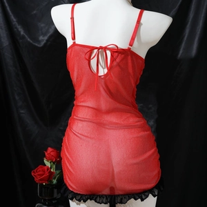 Sexy sheer red lace nightgown with black trim and bow detail on a white mannequin