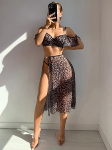 Detail of leopard print lingerie set with mesh skirt and stylish metal ring connectors