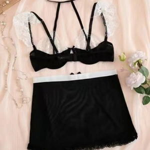 Set lingerie da cameriera bianco e nero con reggiseno a cavezza e gonna con pizzo