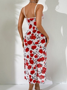 Detail of red floral print on white mesh fabric and sexy open back tie design