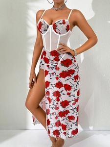 Detail view of mesh maxi dress featuring red rose print and sexy high side slit design