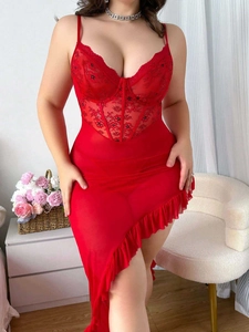 Detail of red plus size lace teddy with floral embroidery and sheer mesh ruffled hem