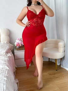 Detail of red floral lace bodice with underwire support and sheer mesh skirt