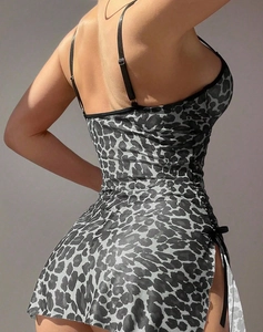 Detail of leopard print lingerie dress featuring side drawstring ruching and a high slit