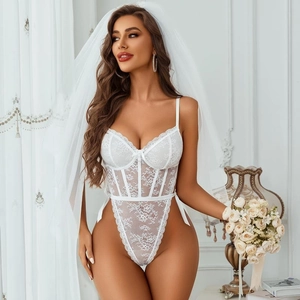 Close-up of white floral lace bodysuit with underwire cups and elegant bridal veil