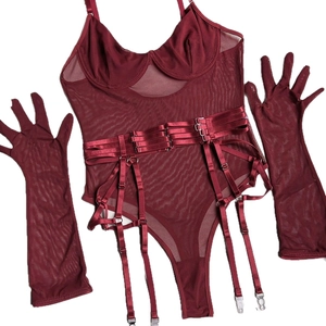 Three-piece dark red mesh bodysuit set with lace-up details and matching long gloves