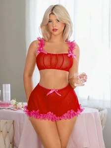 Detail of red and pink mesh lingerie set with 3D flowers and high waist tulle skirt
