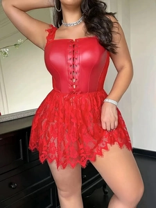 Detailed view of red PU leather corset with cross lacing and delicate eyelash lace trim