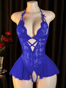 Detailed view of bright blue lace bodysuit with halter neck and bow accent