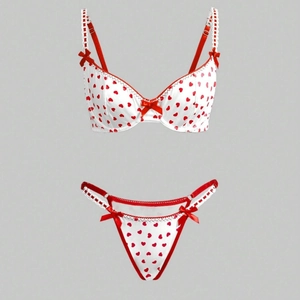 Two-piece white lingerie set with red heart prints, satin fabric and lace trim details
