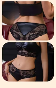 Detaillierte Ansicht des schwarzen Dessous-Sets aus Spitze und Kunstleder auf rotem Sofa