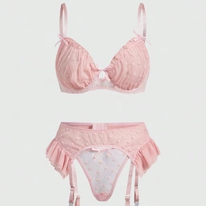 Pink heart mesh lingerie set with lace bra, garter belt and thong in soft pastel tones