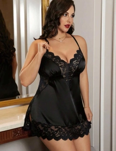 Detailed view of black satin nightgown with floral lace trim and V-neckline design