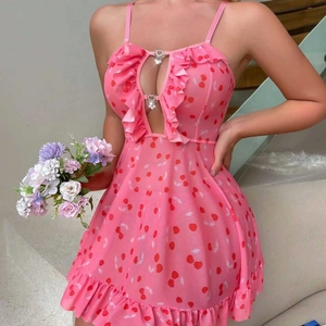 Pink heart print slip dress with mesh fabric, ruffle hem and heart buckles