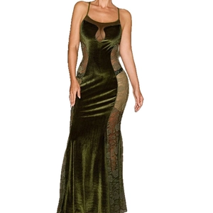 Elegant emerald green velvet dress with lace panels and mermaid fishtail silhouette