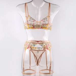 Detailed view of floral embroidery and adjustable back clasp on 3-piece mesh lingerie set