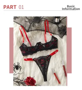 Détail d'ensemble de lingerie en dentelle avec broderie rouge et bretelles réglables