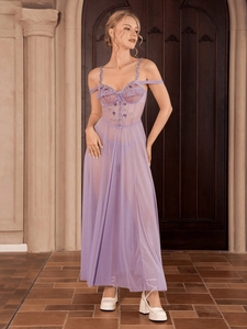 Close-up of lavender mesh nightgown featuring intricate floral embroidery and lace ties