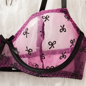 Pink sheer mesh bra with black butterfly embroidery and delicate bow detailing