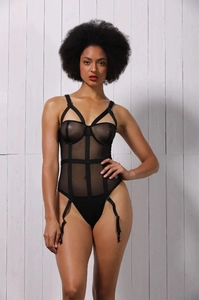 Detailed view of sheer black mesh bodysuit featuring structured lines and garter straps
