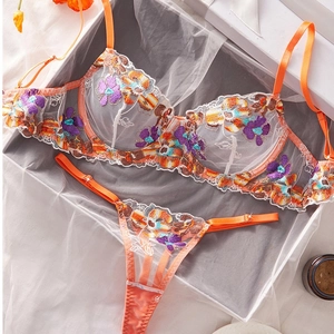 Vibrant orange mesh lingerie set featuring colorful floral embroidery and lace details