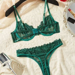 Close-up of emerald lace lingerie set with floral patterns and delicate eyelash trim