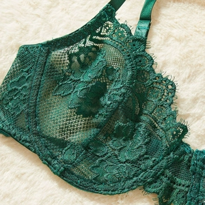Green lace lingerie set featuring floral mesh underwire bra with delicate eyelash trim