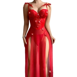 Red sheer evening gown featuring lace cups with floral details and high slit mesh skirt